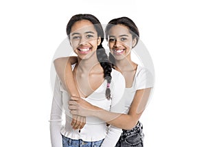 Adorable black twin teen girl on studio white background