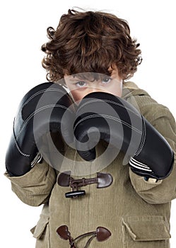 Adorable boy with boxing gloves