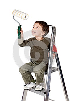Adorable boy painting