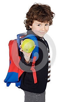 Adorable boy student with knapsack and apple