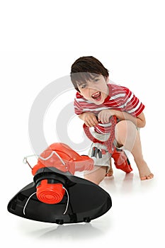 Adorable Boy with Weed Whacker