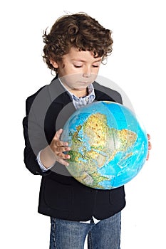 Adorable boy worried about the planet earth photo