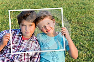 Adorable boys smiling.  looking at viewers