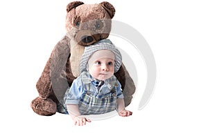 Adorable child boy with rplush toy teddy bea isolated