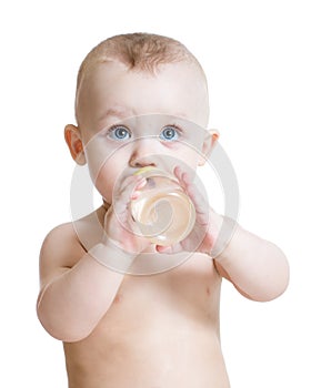 Adorable child drinking from bottle