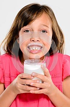 Adorable child with milk moustache