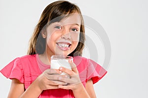 Adorable child with milk moustache