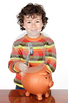 Adorable child with money box of piggy