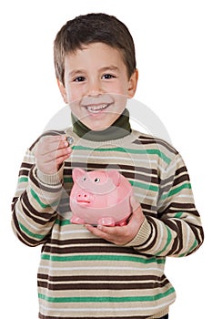 Adorable child with moneybox savings photo