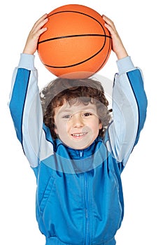 Adorable child playing the basketball