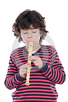 Adorable child playing flute