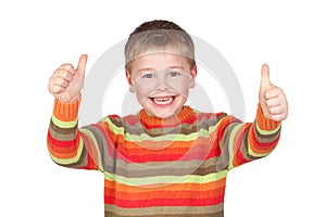 Adorable child with thumbs up