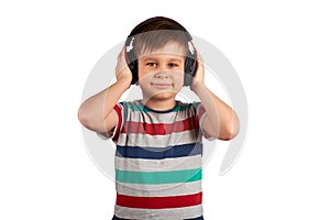 Adorable cute child enjoying favorite songs using wireless headphones. isolated on white background. Leisure, music and