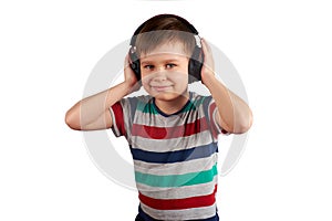 Adorable cute child enjoying favorite songs using wireless headphones. isolated on white background. Leisure, music and