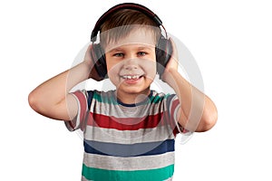 Adorable cute child enjoying favorite songs using wireless headphones. isolated on white background. Leisure, music and