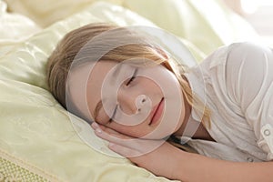 Adorable cute little girl sleeping in bed