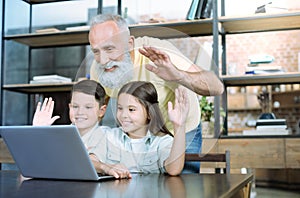 Adorable family having video call at home