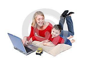 Adorable Family Moment With Mother and Son at the Laptop