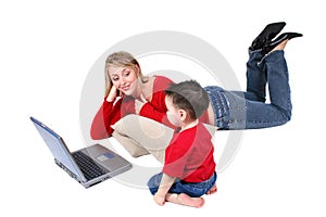 Adorable Family Moment With Mother and Son at the Laptop photo