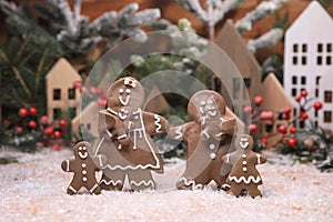 Adorable GingerBread Mom Dad and Children Having a Merry Christmas