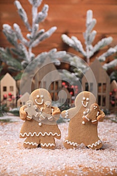 Adorable GingerBread Mom Dad and Children Having a Merry Christmas