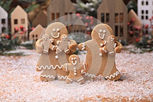 Adorable GingerBread Mom Dad and Children Having a Merry Christmas