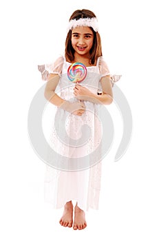 Adorable girl holding lolly pop