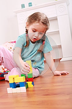 Adorable girl playing