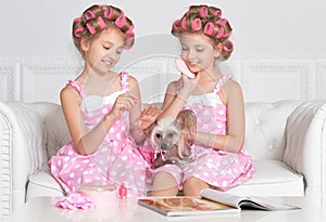 Adorable girls with dog