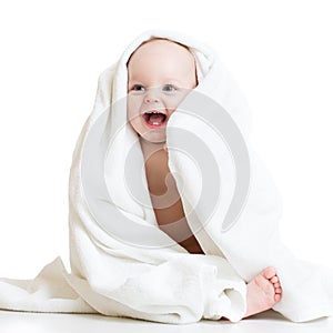 Adorable happy baby in towel