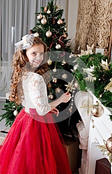 Adorable happy smiling little girl child in princess dress with