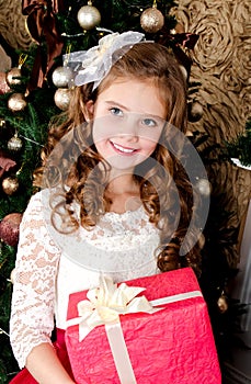 Adorable happy smiling little girl child in princess dress with