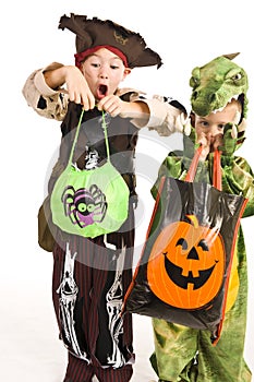 Adorable kids playing trick or treat