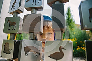 Adorable little 1-2 year old toddler boy having fun on playground in Krakow, Poland