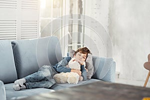 Adorable little boy sleeping with his toy