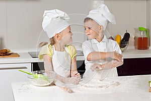 Adorable Little Chefs Playing at Kitchen