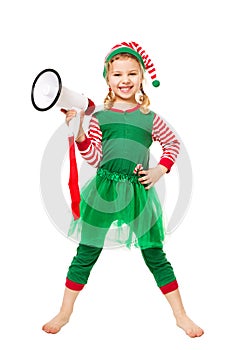 Adorable Little Christmas Elf Girl holding Megaphone.  Happy Smiling Child in Masquerade Costume. Christmas Advert and Sale