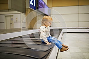 Adorable little girl in the airport