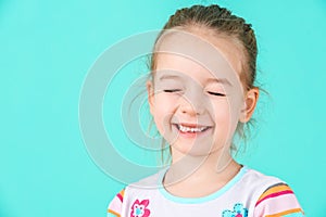 Adorable little girl with attitude. Cheeky preschooler headshot portrait.