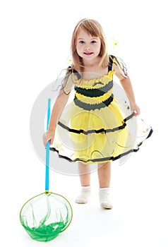 Adorable little girl with a butterfly net for