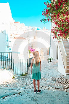 Adorable little girl in european city outdoors