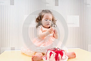 Adorable little girl getting herself messy