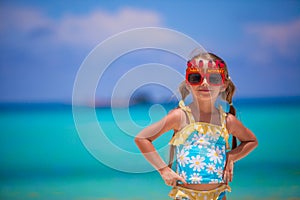 Adorable little girl in Happy Birthday glasses