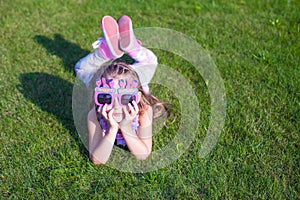 Adorable little girl in Happy Birthday glasses