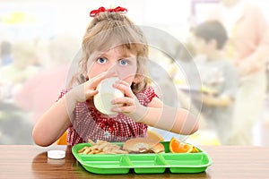 Adorable Little Girl Having Lunch at School