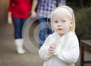 Adorable Little Girl with Her Mommy and Daddy Portrait