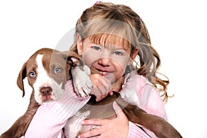 Adorable Little Girl Holding Her Puppy