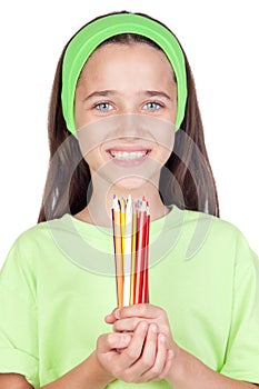 Adorable little girl with many colored pencils