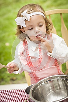 Adorable Little Girl Playing Chef Cooking
