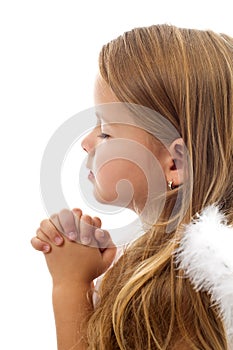 Adorable little girl praying